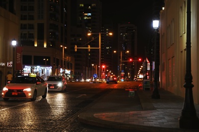Photo of DUBAI, UNITED ARAB EMIRATES - NOVEMBER 03, 2018: City street traffic at night