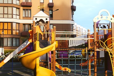 Colourful outdoor playground for children in residential area