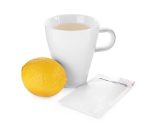 Cup of hot tea, lemon and cold remedy on white background