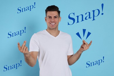 Handsome man snapping fingers on light blue background