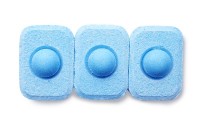 Photo of Water softener tablets on white background, top view