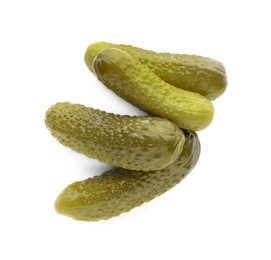 Pile of tasty pickled cucumbers on white background, top view