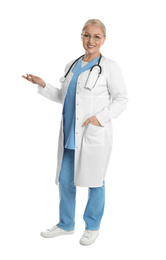Full length portrait of mature doctor on white background