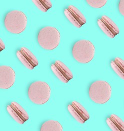 Delicious macarons on turquoise background, flat lay 
