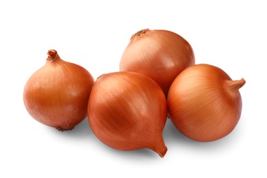 Photo of Many fresh unpeeled onions on white background