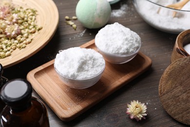 Bath bomb mold and ingredients on wooden table