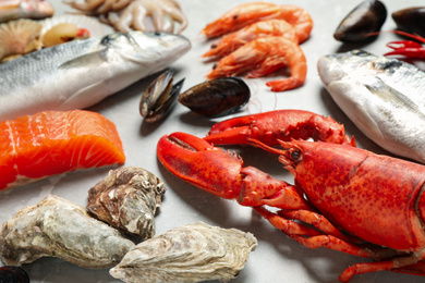 Fresh fish and seafood on marble table