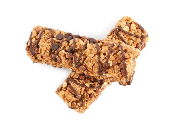 Crunchy granola bars with chocolate on white background, top view. High protein snack