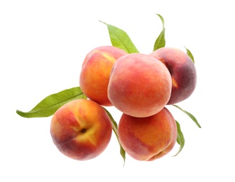 Delicious ripe juicy peaches with leaves isolated on white, top view