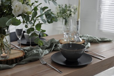 Festive table setting with beautiful tableware and decor indoors