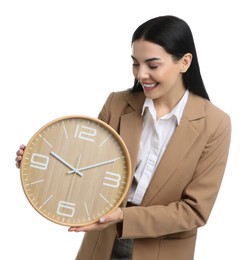 Businesswoman holding clock on white background. Time management