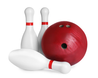 Red bowling ball and pins isolated on white