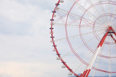 Beautiful large Ferris wheel outdoors, space for text