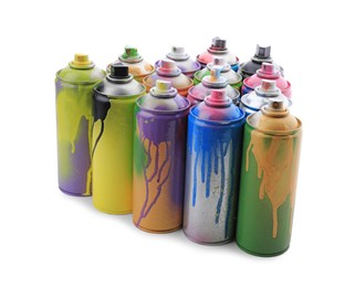 Used cans of spray paints on white background. Graffiti supplies