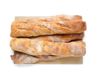 Crispy French baguettes on white background, top view. Fresh bread