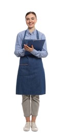 Beautiful young woman in clean denim apron with clipboard on white background