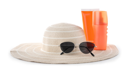 Photo of Sun protection products, sunglasses and hat on white background. Beach objects