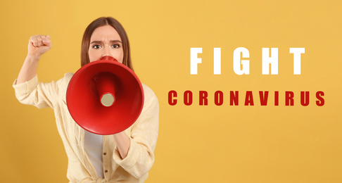 Young woman with megaphone on yellow background. Fighting with coronavirus