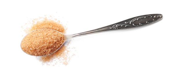 Spoon with brown sugar isolated on white, top view