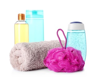 Personal hygiene products with towel and shower puff on white background