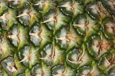 Photo of Fresh ripe juicy pineapple as background, closeup