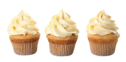 Delicious birthday cupcakes decorated with cream on white background