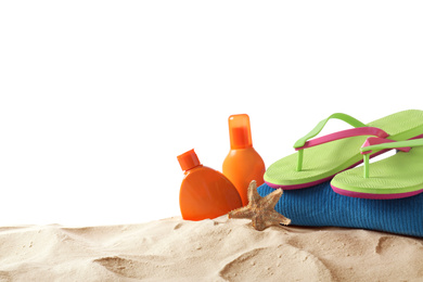 Photo of Composition with beach objects on sand against white background. Space for text