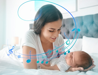 Flying music notes and young woman with her newborn baby on bed. Lullaby songs 