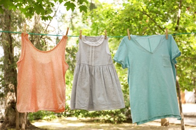 Laundry line with clothes outdoors on sunny day
