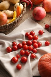 Different fresh ripe vegetables, berries and fruits on wooden table. Farmer produce