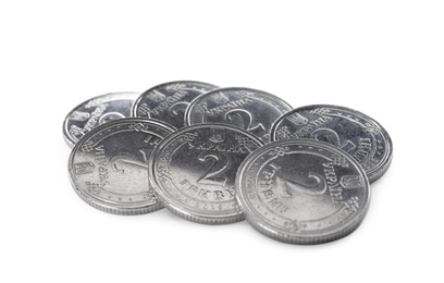 Many Ukrainian coins on white background. National currency