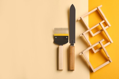 Beekeeping tools on color background, flat lay. Space for text