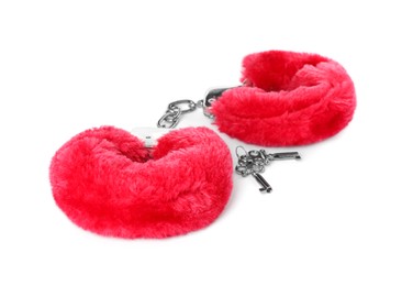 Red furry handcuffs on white background. Accessory for sexual roleplay