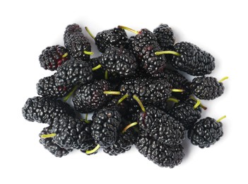 Pile of ripe black mulberries on white background, top view