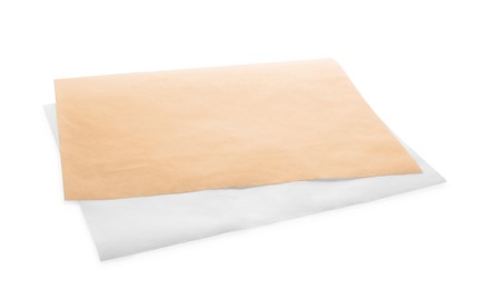 Photo of Sheets of baking paper on white background
