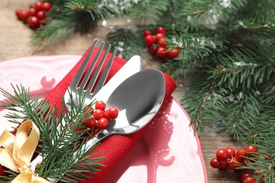 Christmas table setting on wooden background, closeup