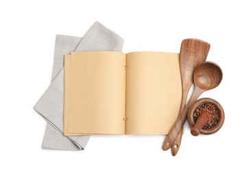 Blank recipe book, spices, napkin and wooden utensils on white background, top view. Space for text