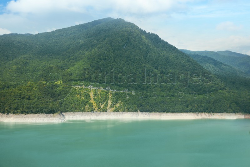 Photo of Beautiful mountain landscape with forest and green hills near river