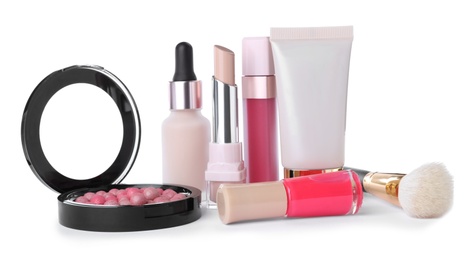 Different luxury cosmetic products on white background