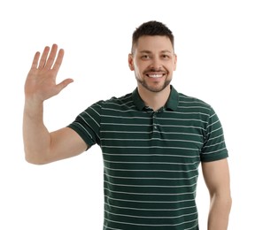 Cheerful man waving to say hello on white background