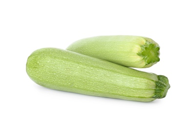 Raw green ripe zucchinis isolated on white