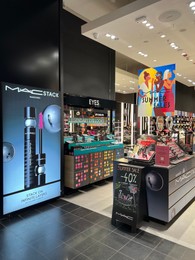 Photo of Poland, Warsaw - July 12, 2022: Official Mac store with cosmetics in shopping mall