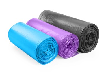 Rolls of different garbage bags on white background. Cleaning supplies