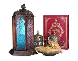 Decorative Arabic lantern, Quran, baklava and coffee on white background