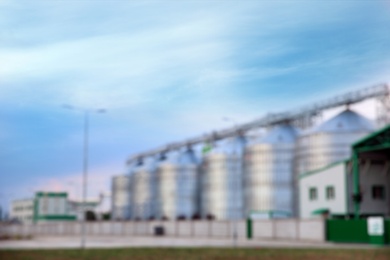 Photo of Blurred view of modern granaries for storing cereal grains