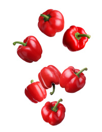 Image of Set of flying red bell peppers on white background