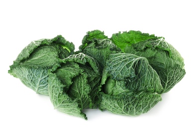 Photo of Fresh ripe savoy cabbages on white background