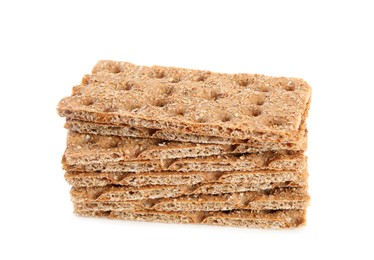 Pieces of crunchy rye crispbreads on white background