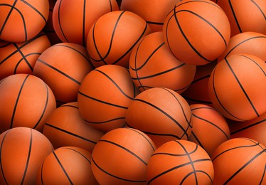 Many orange basketball balls as background 