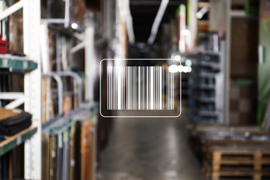 Barcode and blurred view of modern wholesale warehouse